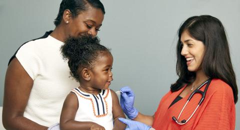 Image of child receiving vaccination