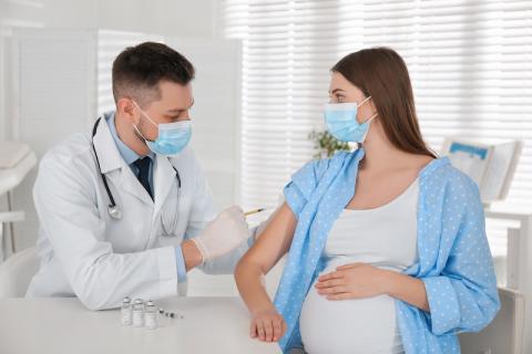 Image of woman being vaccinated