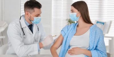 Image of woman being vaccinated